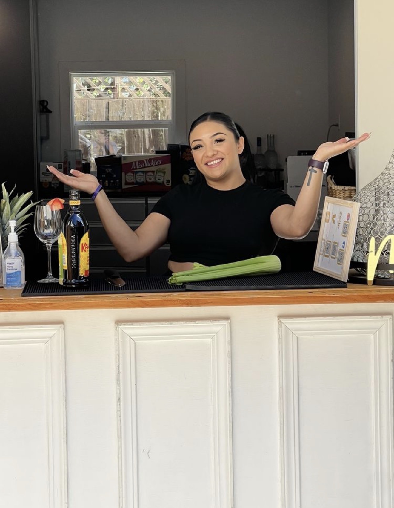 Adina Mercado smiling during mobile bartending service