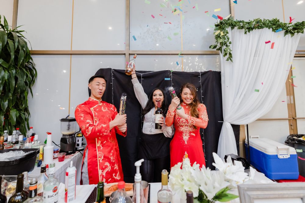 Adina Mercado celebrating with two event hosts at a No Last Call Bartending event